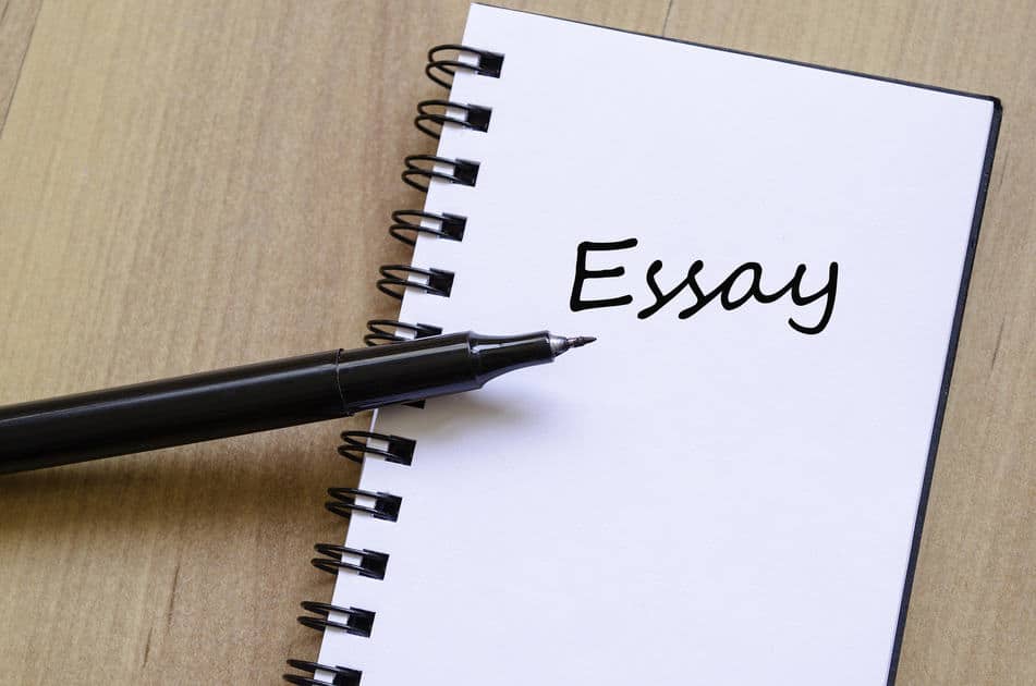 Image of a notepad with the word essay written on it
